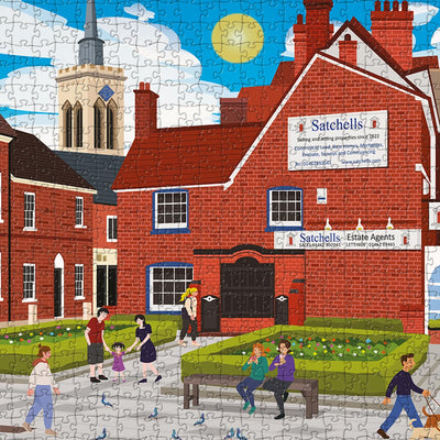 A closeup view of our Baldock Town Centre jigsaw puzzle which depicts an Illustrated town with buildings