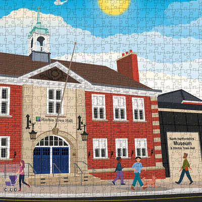 closeup view of our Hitchin town hall jigsaw puzzle which depicts an Illustrated town square with people and buildings
