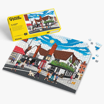 St Albans town centre Jigsaw puzzle with a colourful scene of a town and yellow box packaging on a white background