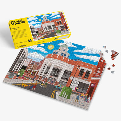 Watford town centre Jigsaw puzzle with a colourful scene of a town centre and yellow box packaging on a white background