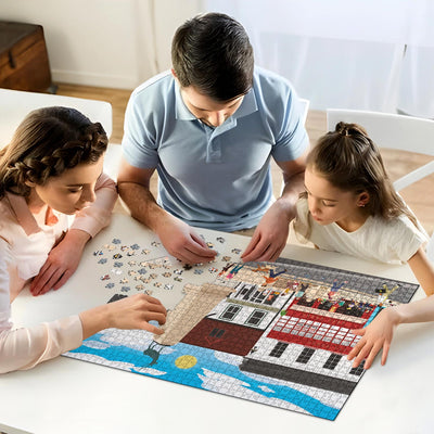 A mum, dad and daughter working on solving our Hertford Parliament Square jigsaw puzzle at home