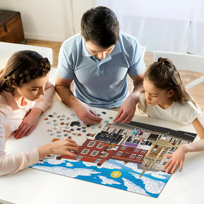 Parents and daughter working on solving our Leighton Buzzard Town Centre jigsaw puzzle at home