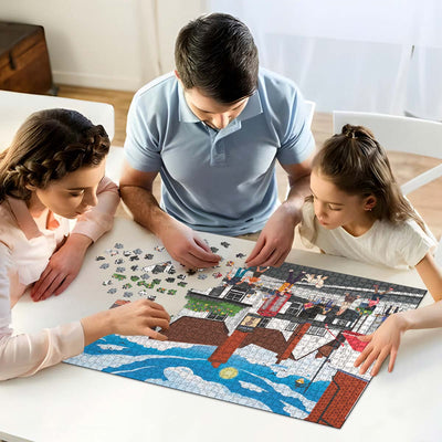 A mum, dad and daughter working on solving our St Albans town centre jigsaw puzzle at home