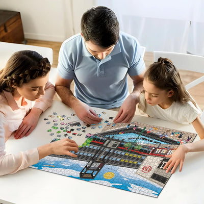 A mum, dad and daughter working on solving our Stevenage town centre jigsaw puzzle at home
